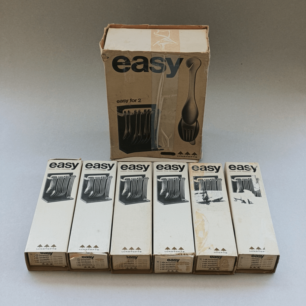 - Ensemble des 7 boîtes d'origine des couverts "Easy" Lundtofte et de leur support