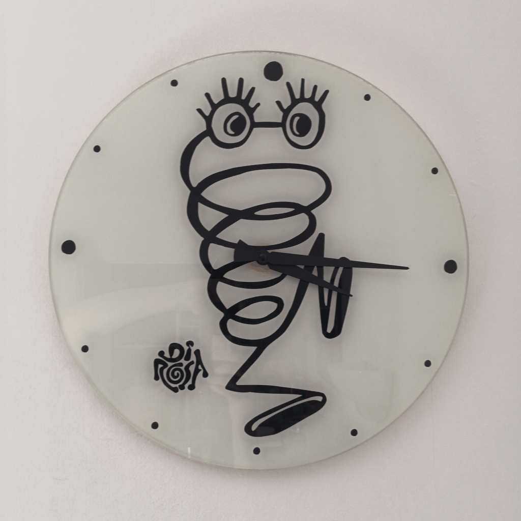 Horloge en verre sérigraphié d'un personnage typique de l'artiste Hervé Di Rosa dans les années 80
